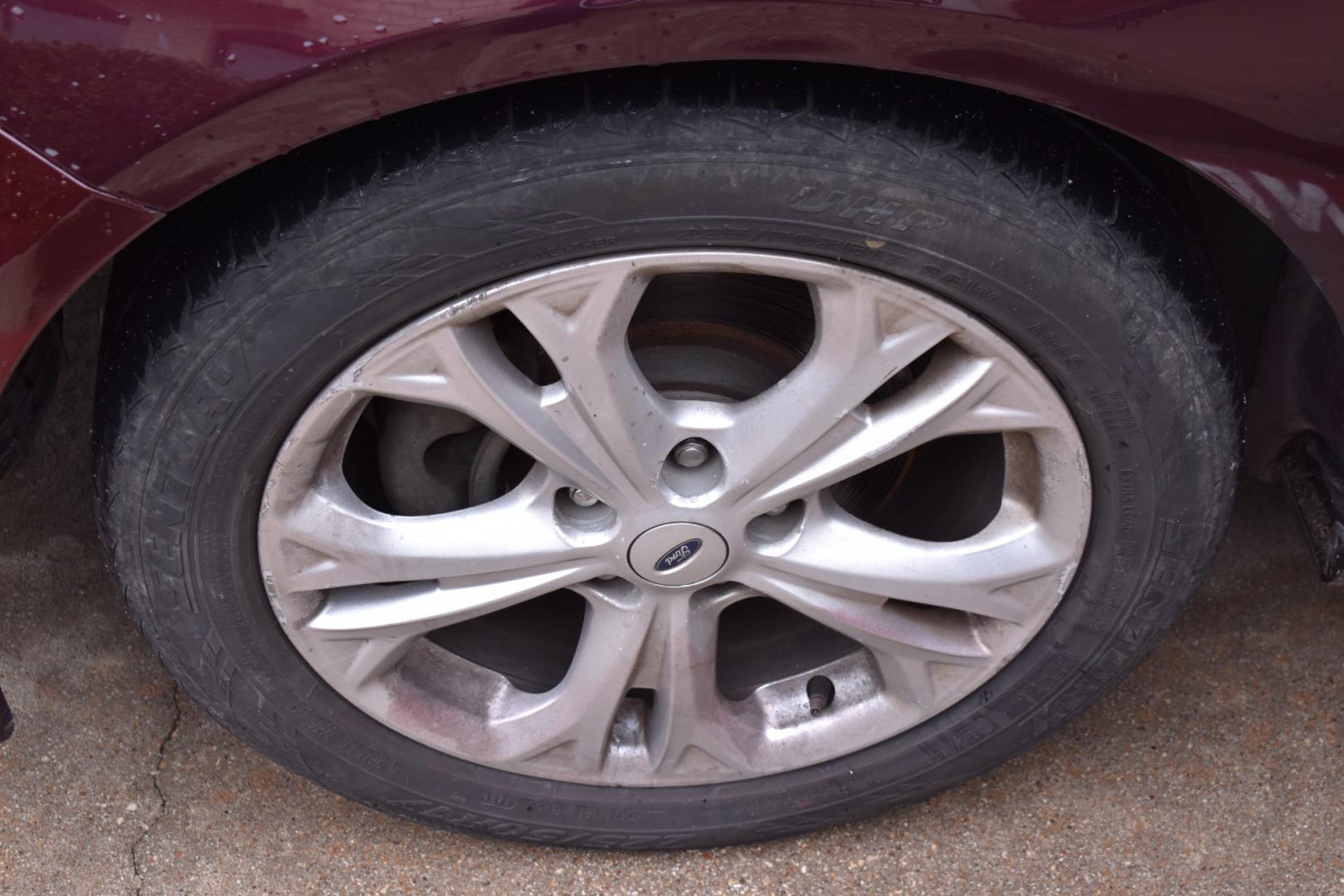 2012 Red /Gray Ford Fusion SE (3FAHP0HA0CR) with an 2.5L L4 DOHC 16V engine, 6 Speed AUTOMATIC transmission, located at 5925 E. BELKNAP ST., HALTOM CITY, TX, 76117, (817) 834-4222, 32.803799, -97.259003 - Photo#22
